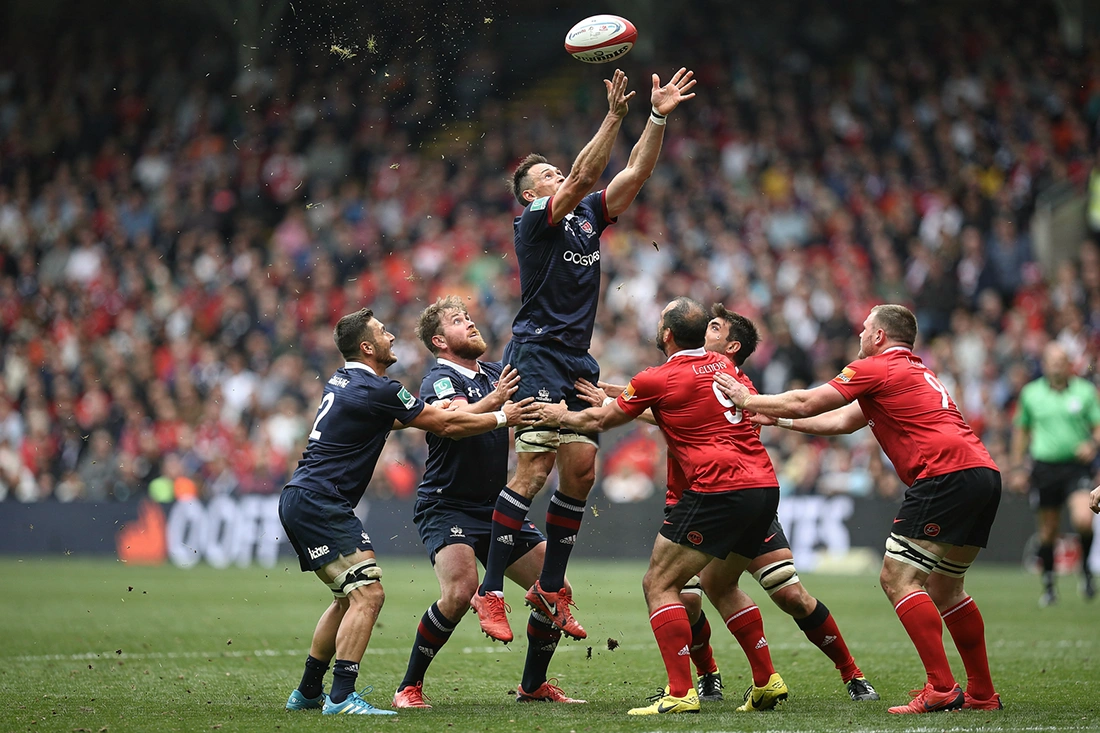 Rugby lineout action during international match showing players competing for the ball